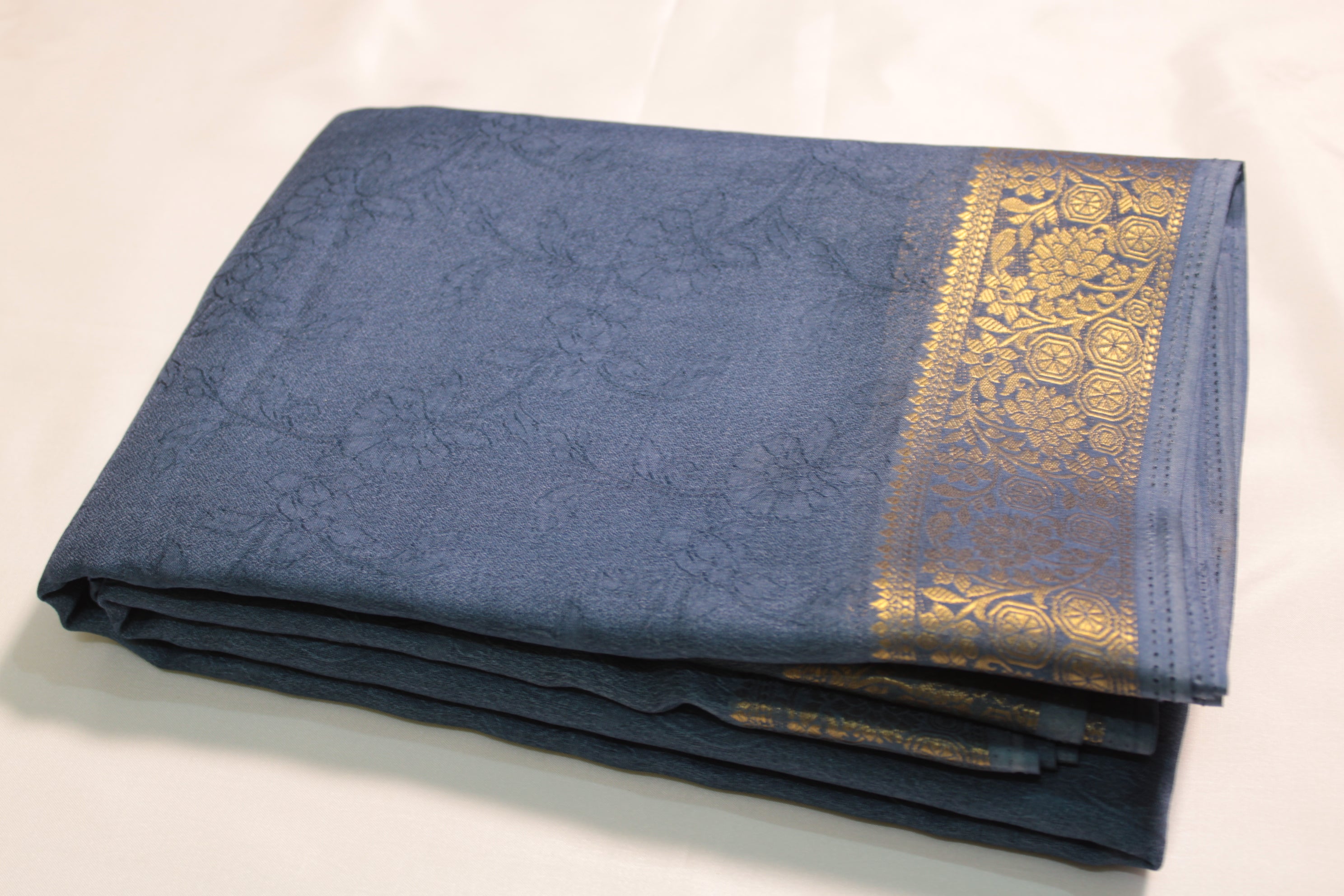 Silk saree with gold border