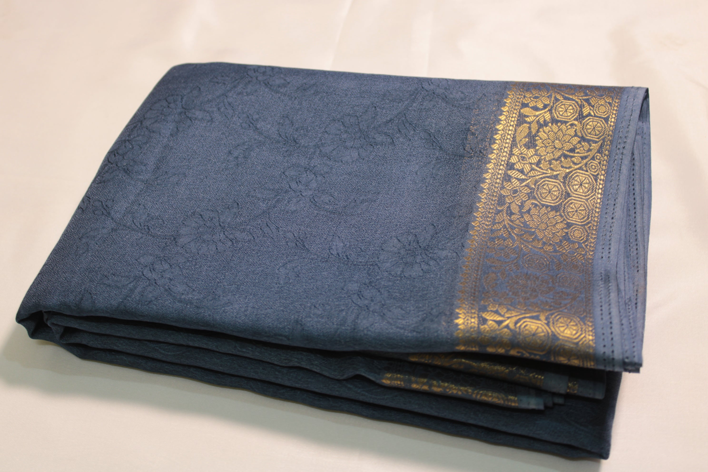 Silk saree with gold border